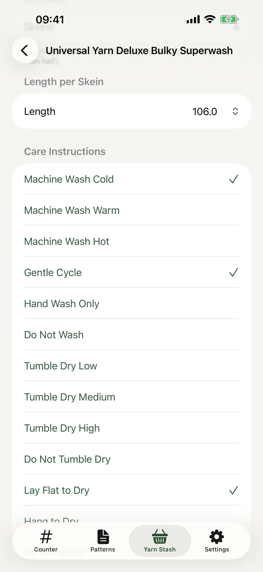 The care instructions section with wash, dry, iron, bleach, and dry clean settings.